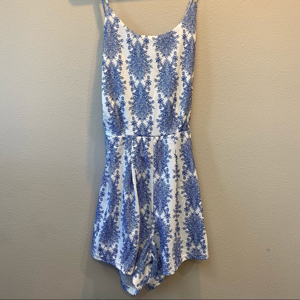 Blue and white patterned romper